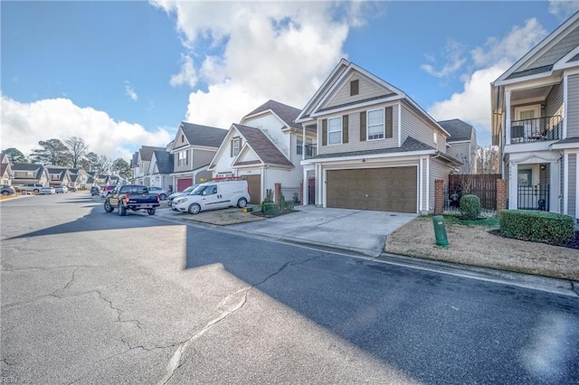 view of road with curbs, sidewalks, and a residential view