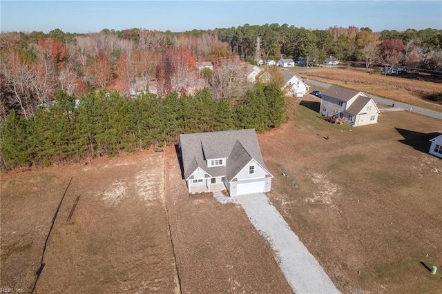 aerial view featuring a view of trees