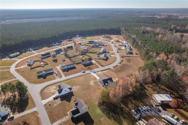 bird's eye view featuring a view of trees