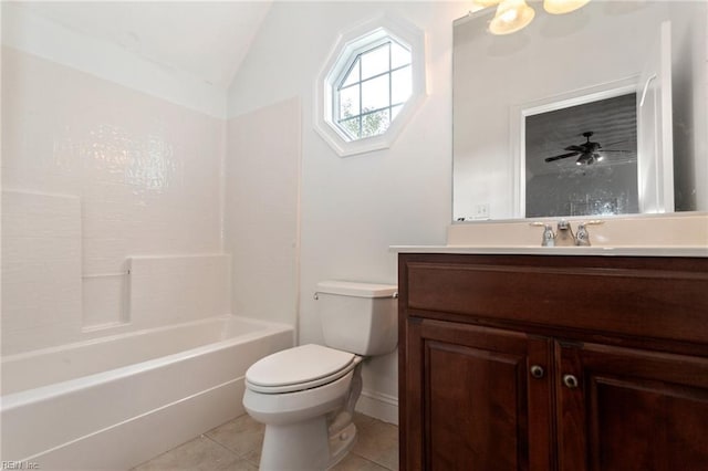 full bathroom featuring lofted ceiling, tile patterned flooring, toilet, vanity, and baseboards