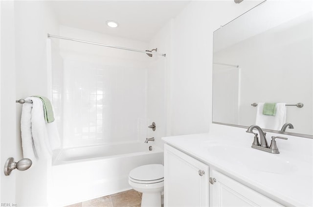 full bathroom featuring shower / tub combination, vanity, toilet, and tile patterned floors