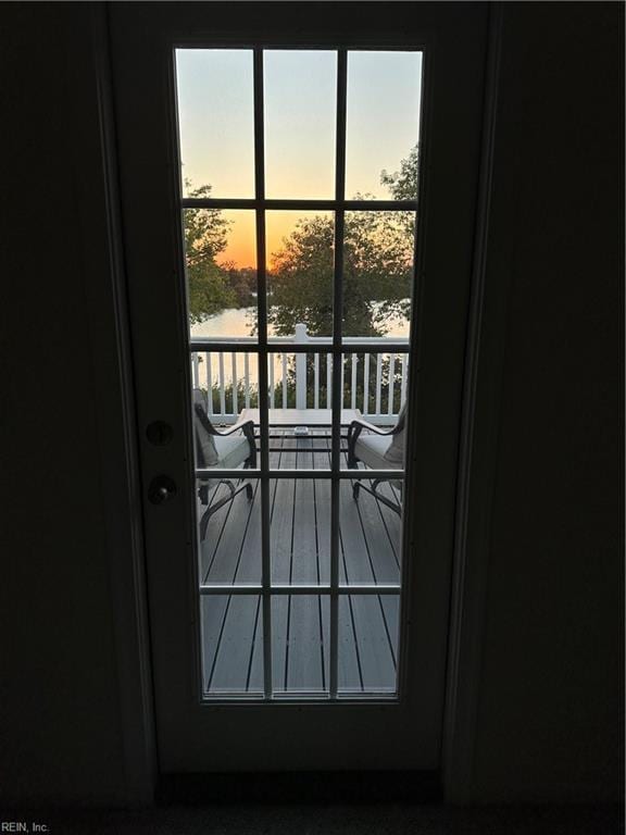 entryway with a water view