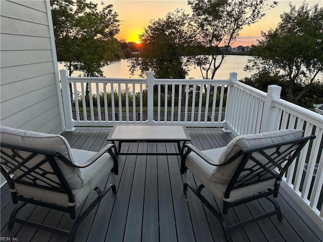 deck at dusk with a water view