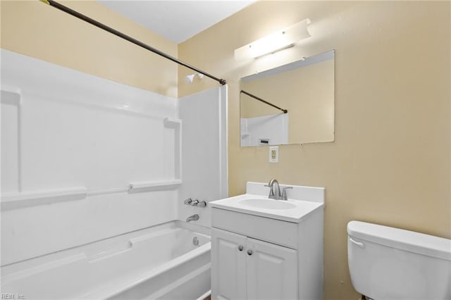 bathroom with shower / bath combination, vanity, and toilet