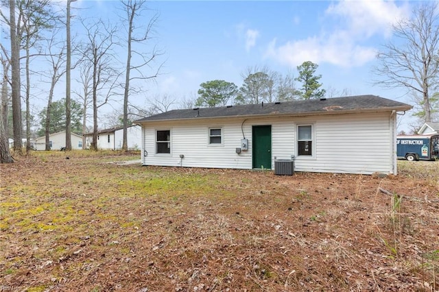 back of property featuring cooling unit