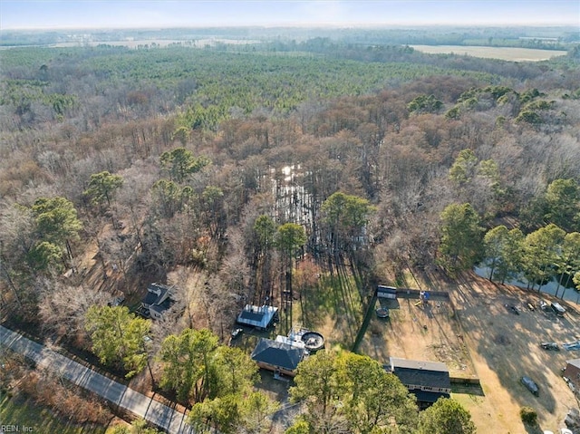 bird's eye view with a forest view
