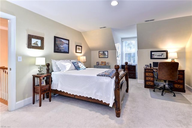 bedroom featuring lofted ceiling, baseboards, visible vents, and light colored carpet