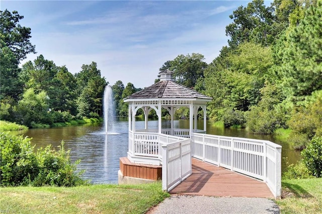 dock area with a gazebo and a water view