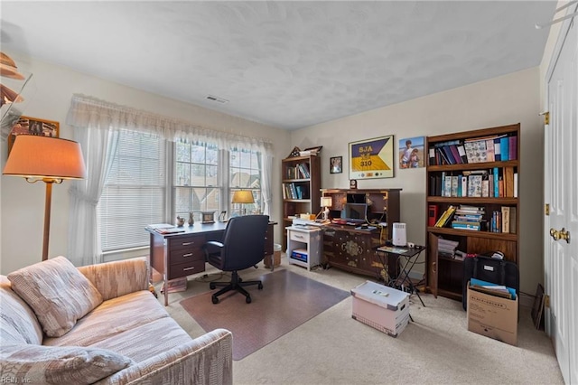 office space with carpet floors and visible vents