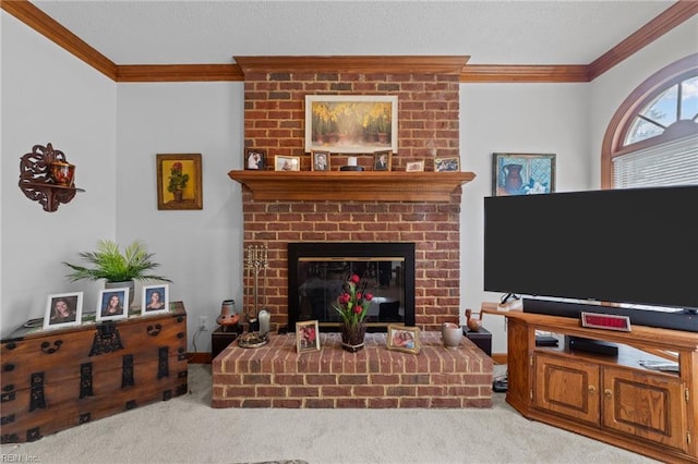 living area with carpet floors, a fireplace, and crown molding