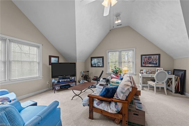 living room featuring a ceiling fan, carpet, lofted ceiling, and baseboards