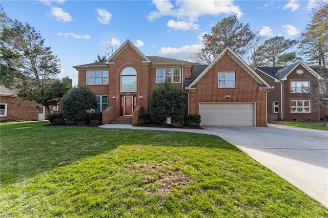 colonial inspired home with driveway, an attached garage, a front lawn, and brick siding