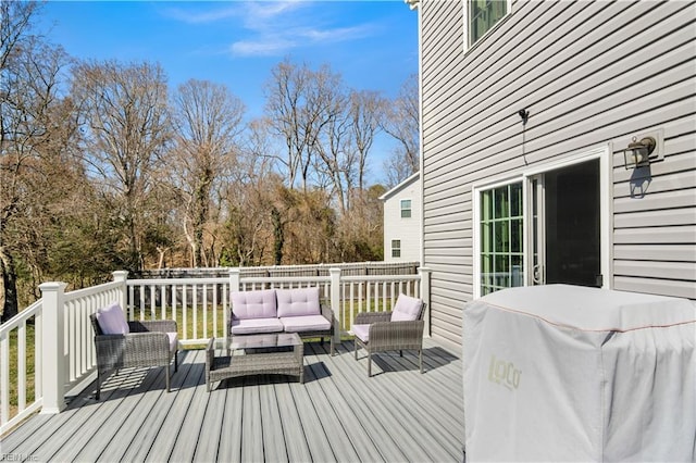 wooden terrace featuring an outdoor hangout area and area for grilling