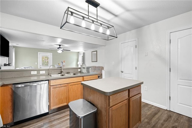 kitchen featuring dark wood-style floors, a center island, dishwasher, and a sink