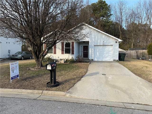 ranch-style house with a garage, concrete driveway, a front lawn, and fence