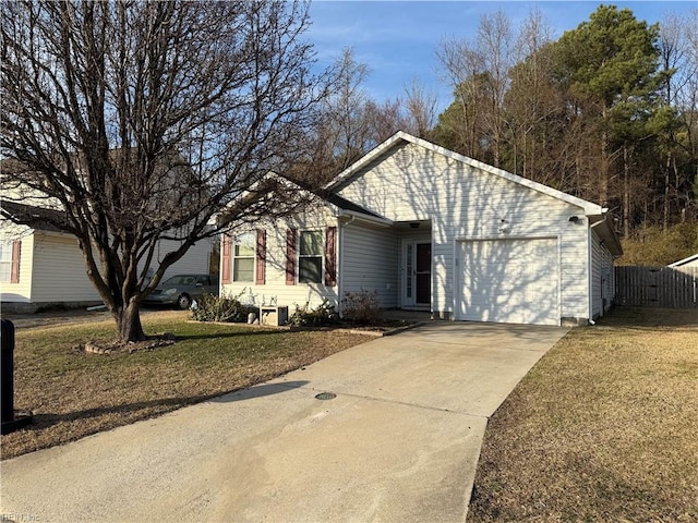 ranch-style home with driveway, a front lawn, and an attached garage