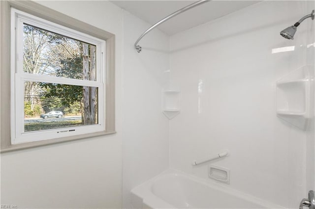 bathroom with shower / bathtub combination