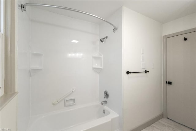 bathroom featuring tub / shower combination