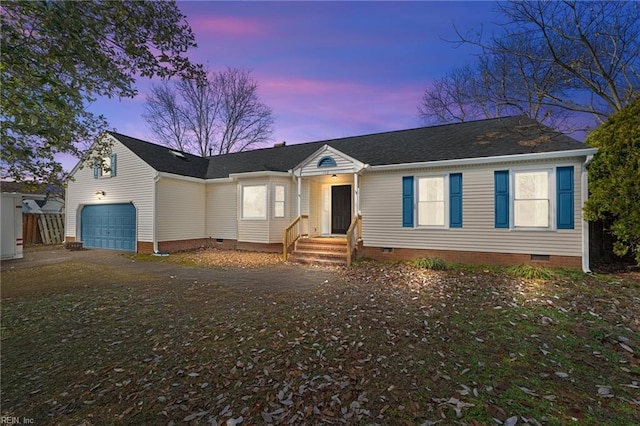 single story home featuring crawl space and driveway