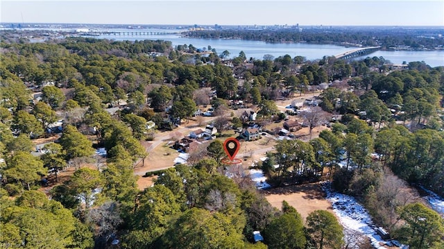 aerial view featuring a water view and a view of trees