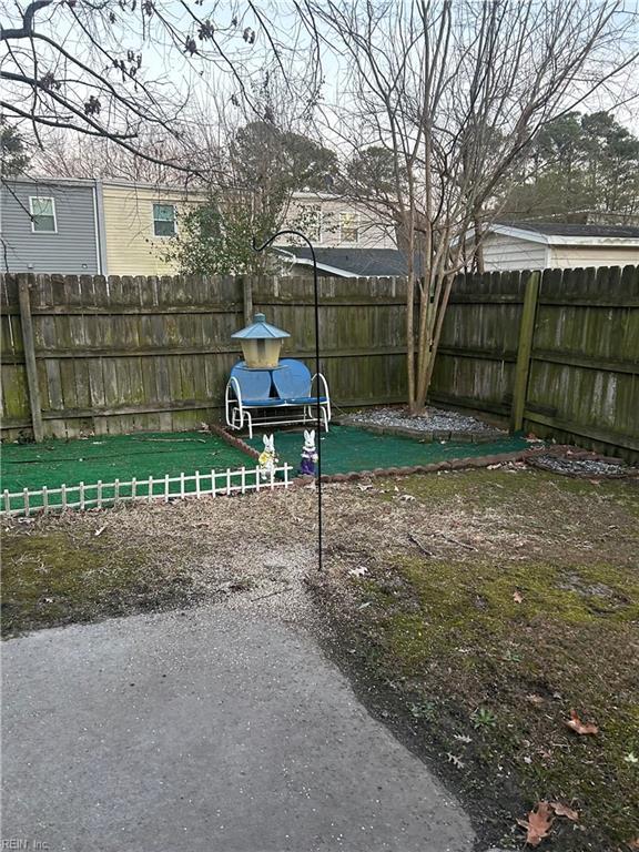 view of yard with fence