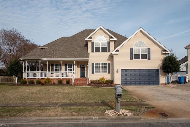 view of front of house featuring covered porch, an attached garage, fence, driveway, and a front lawn