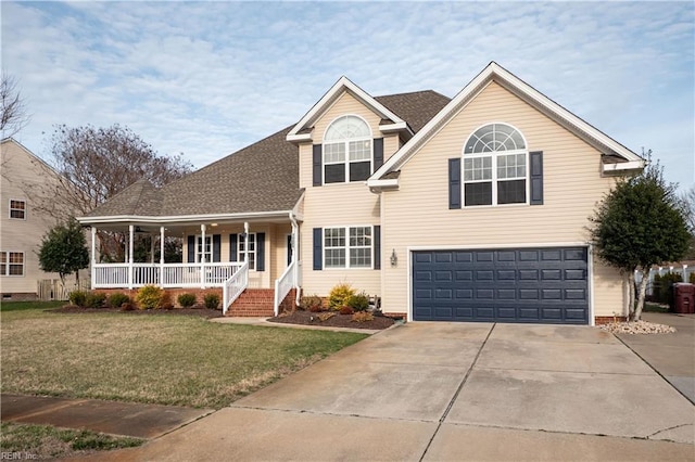 traditional-style house featuring concrete driveway, roof with shingles, an attached garage, a porch, and a front yard