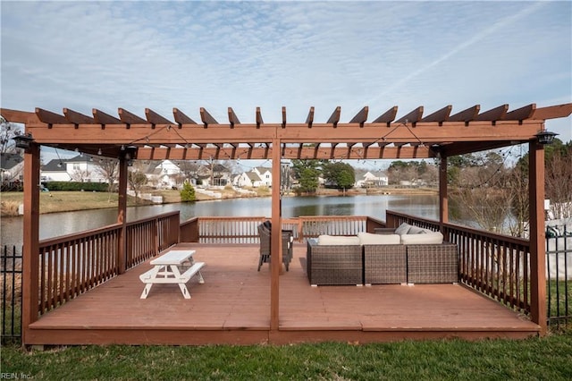 wooden deck featuring a water view, an outdoor hangout area, and a pergola