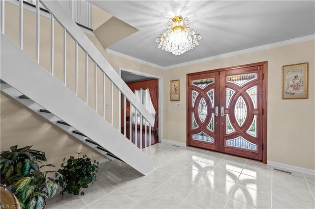 tiled foyer entrance featuring a chandelier, french doors, stairway, and crown molding