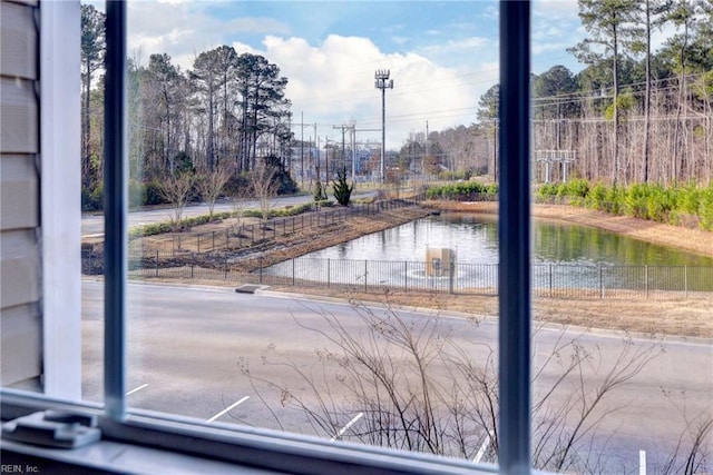 view of water feature with fence