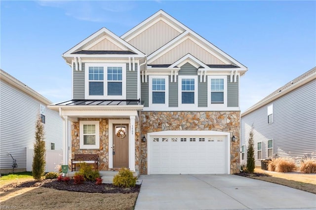 craftsman inspired home featuring metal roof, an attached garage, concrete driveway, board and batten siding, and a standing seam roof