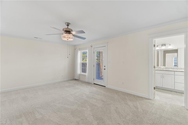 unfurnished room with light carpet, baseboards, and ornamental molding