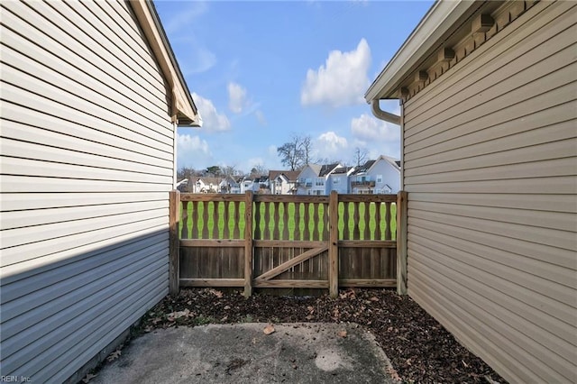 view of yard with fence and a residential view