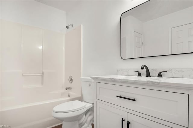 full bath featuring shower / bath combination, vanity, and toilet