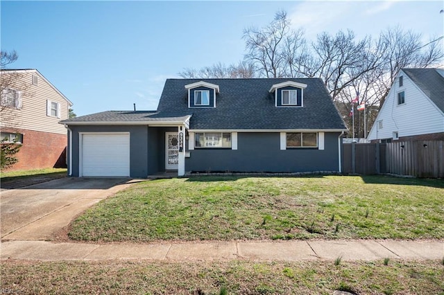 view of front of house featuring an attached garage, a shingled roof, fence, driveway, and a front lawn