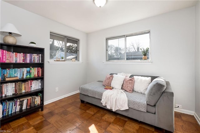 sitting room featuring baseboards