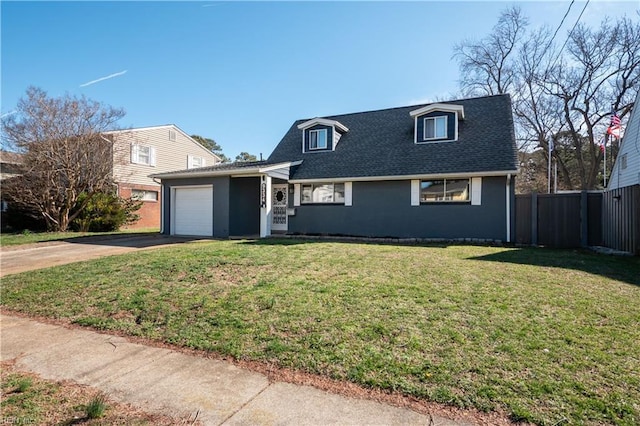 view of front of home with roof with shingles, an attached garage, fence, driveway, and a front lawn