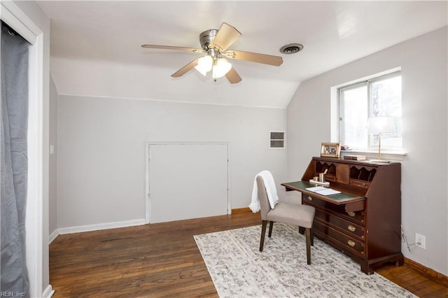 office with lofted ceiling, baseboards, visible vents, and dark wood-type flooring