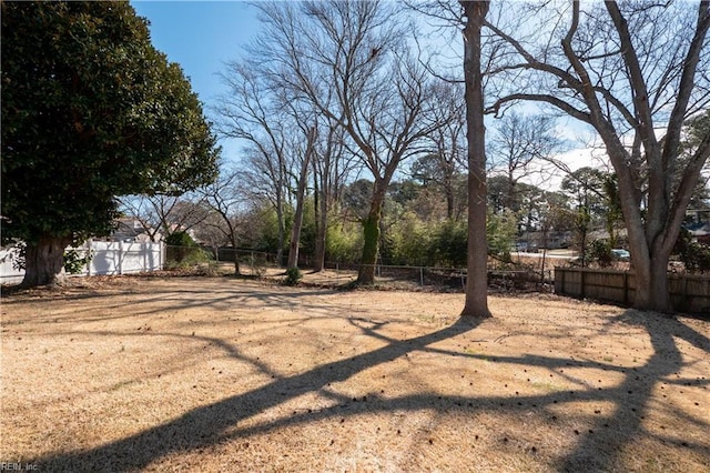 view of yard with fence