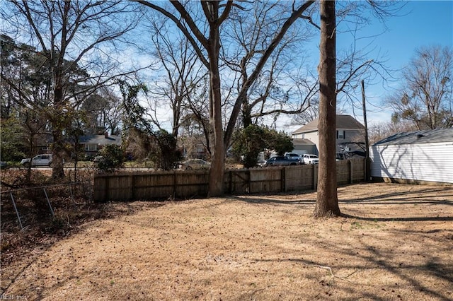 view of yard with fence