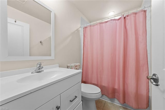 full bathroom with toilet, vanity, shower / bath combo with shower curtain, and tile patterned floors