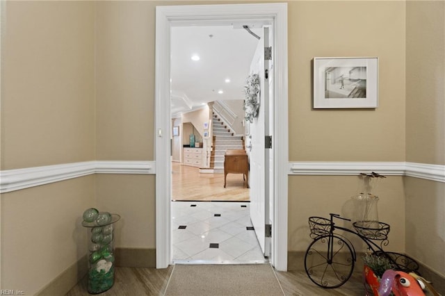 entryway featuring stairway and tile patterned floors