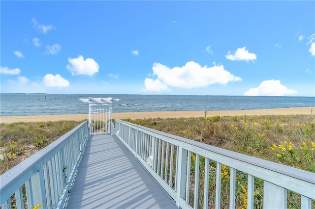 view of home's community with a view of the beach and a water view