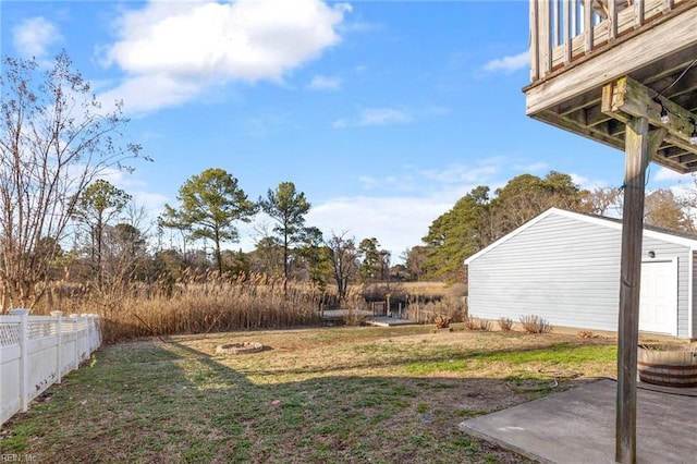 view of yard featuring a patio area and fence