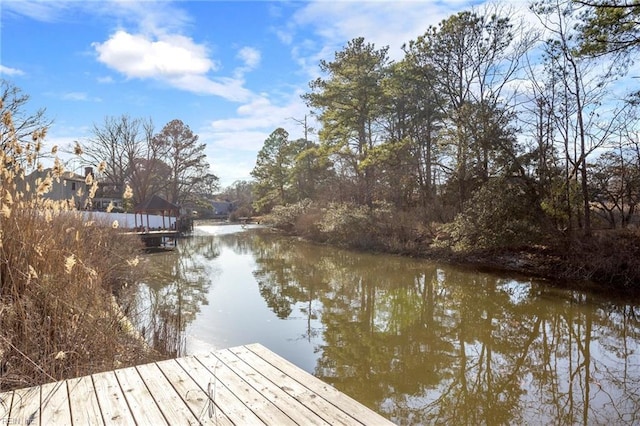 view of dock with a water view