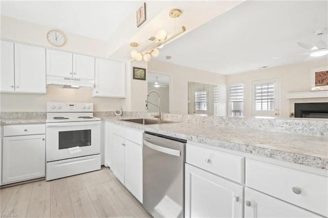 kitchen featuring white electric stove, stainless steel dishwasher, a ceiling fan, a sink, and under cabinet range hood