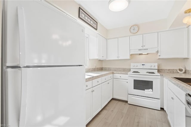 kitchen featuring light countertops, white appliances, white cabinets, and under cabinet range hood