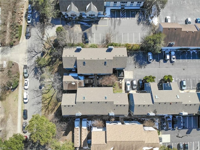 birds eye view of property with a residential view