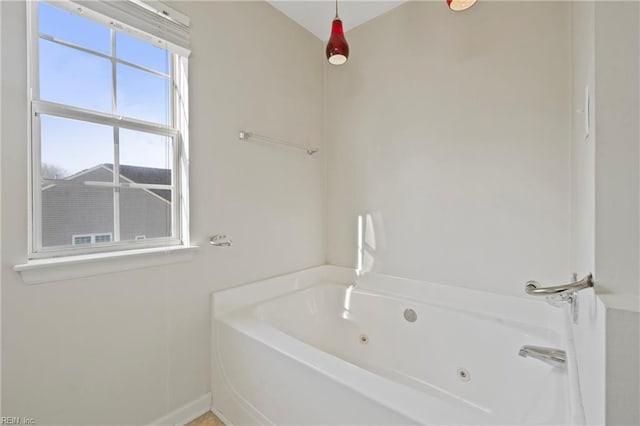 bathroom featuring a jetted tub