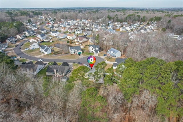 birds eye view of property with a residential view